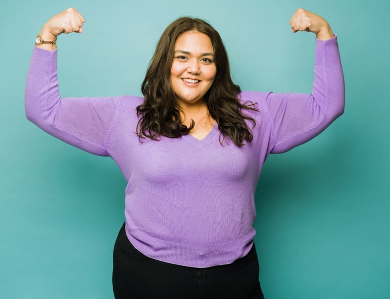 a woman with a purple shirt and black pants