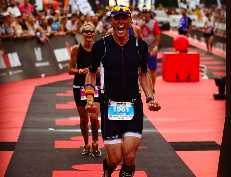 James Oswald finishing Ironman Vichy in HUUB trisuit