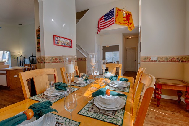 a dining room table with flags in florida
