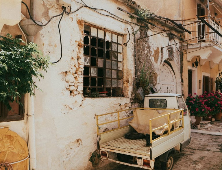 a truck parked in front of a building
