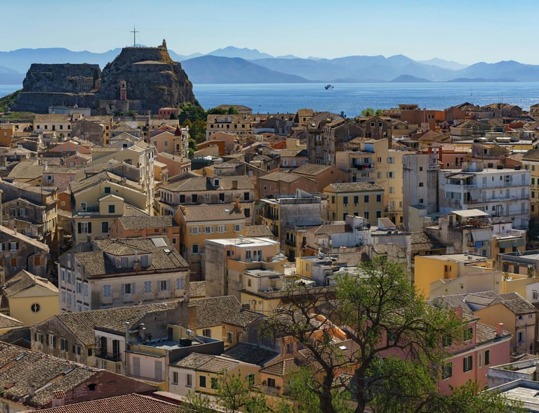 a cityscape of a large city with a view of the water