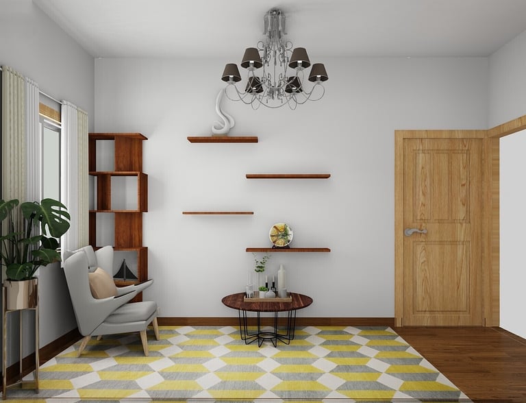 Modern living room interior with a grey armchair, geometric rug, and floating wooden shelves.