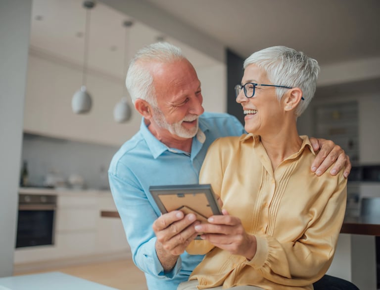 HAPPY COUPLE LOOKING BACK ON MEMEORIES