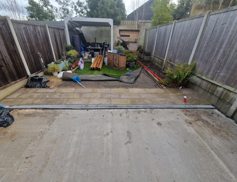 A before picture of the backyard patio