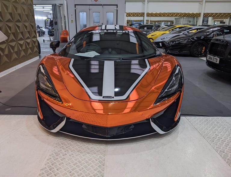 McLaren 570s wrapped in chrome orange and custom livery kit