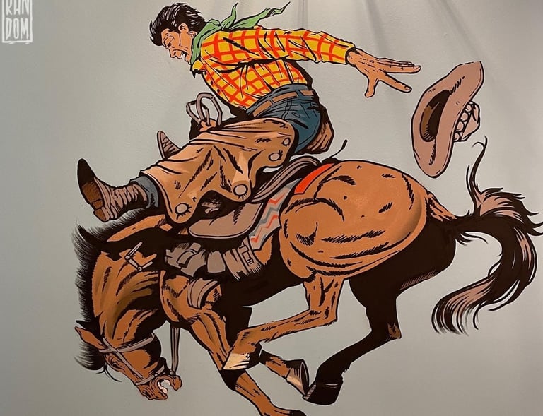 mural de un baquero a caballo en una pared de un restaurante