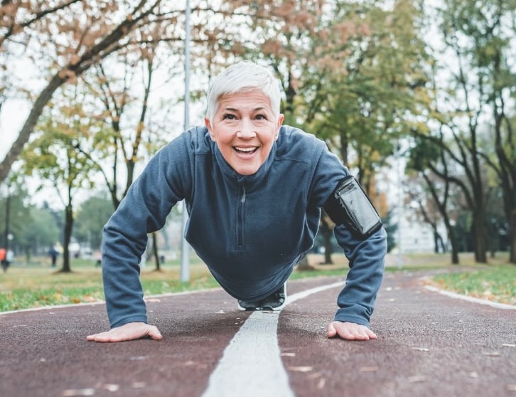 Older woman exercising pain free after pelvic floor therapy dry needling treatment
