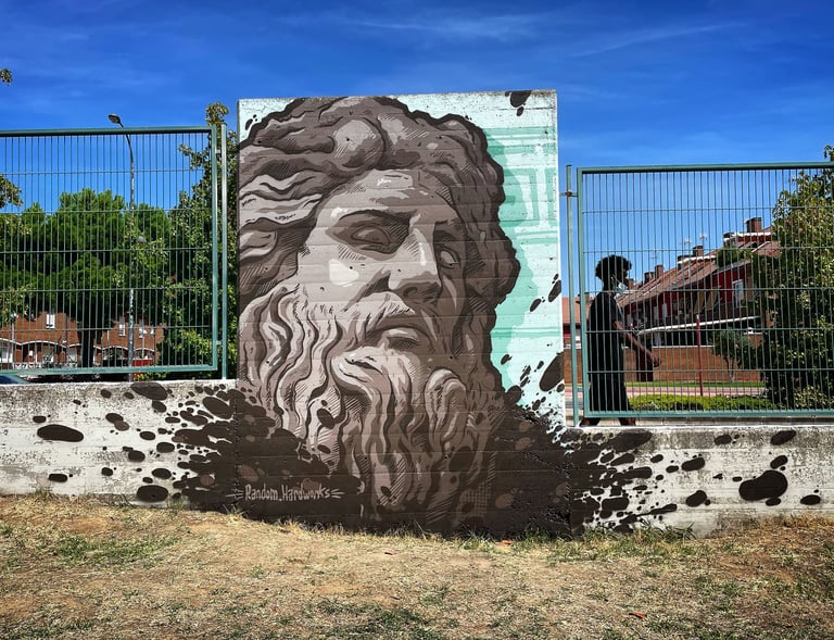 Mural de zeus en un evento de graffiti.