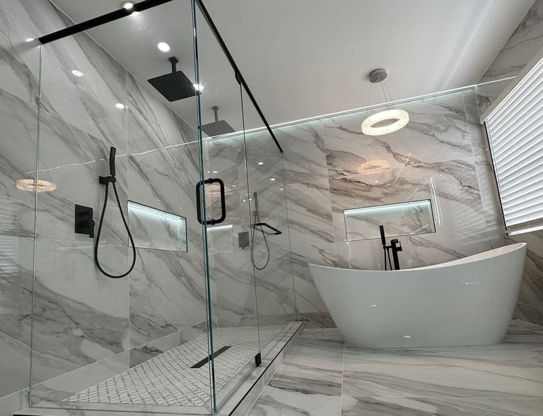 Luxurious glass shower and bathtub with marble walls – SparkEaseCleaning deep cleaning and detailing