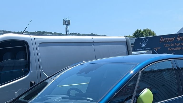 lime green printed vinyl wrap applied to a electric cupra