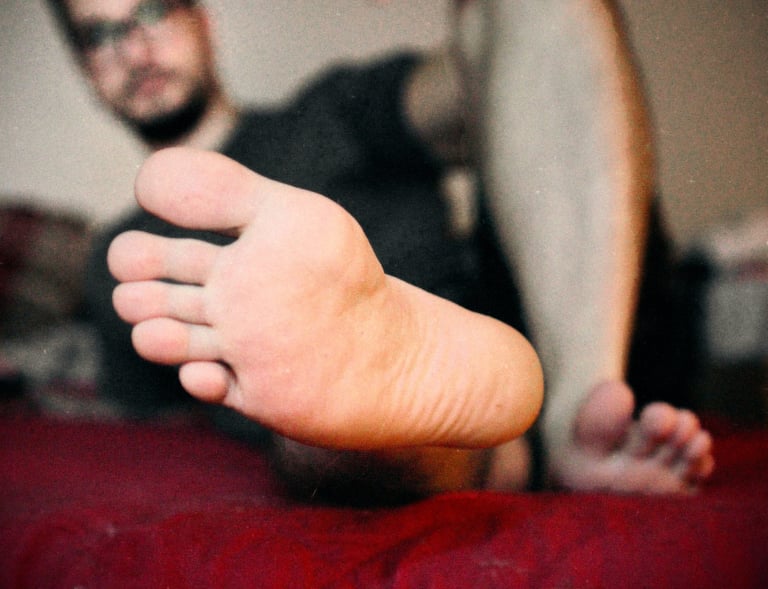 a man showing his sole