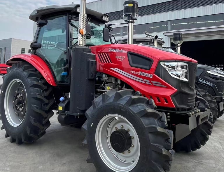 a red tractor with a large wheel on it