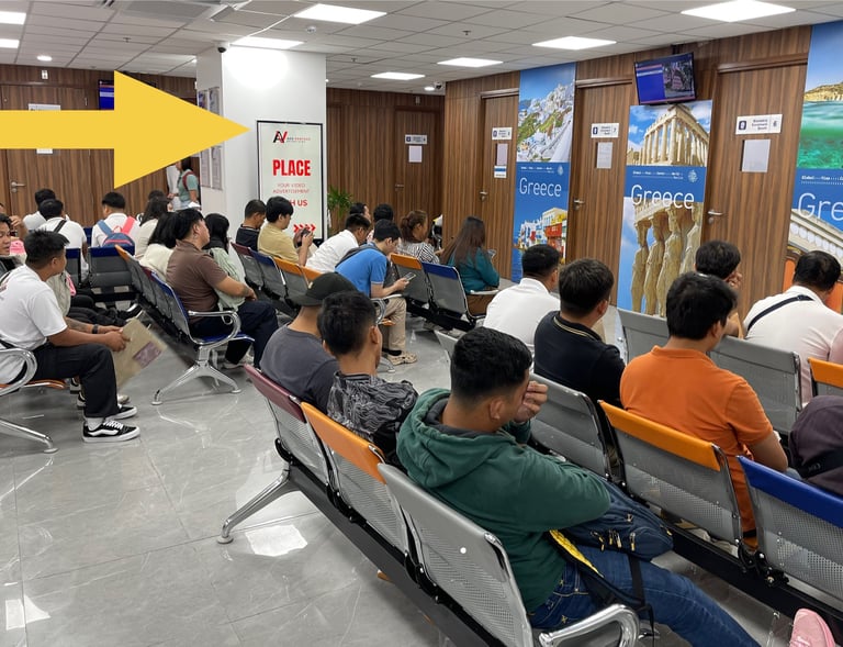 alt="digital advertising screen inside Visa Center waiting area Makati City Philippines"