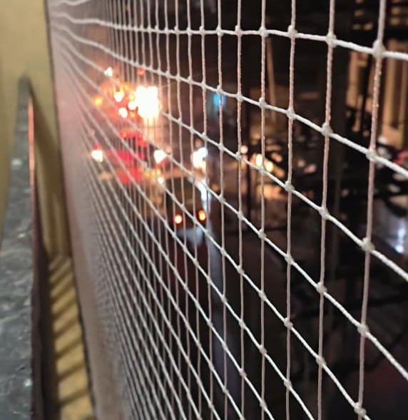 Before and after comparison of a balcony area, first with pigeons nesting and then protected by the 