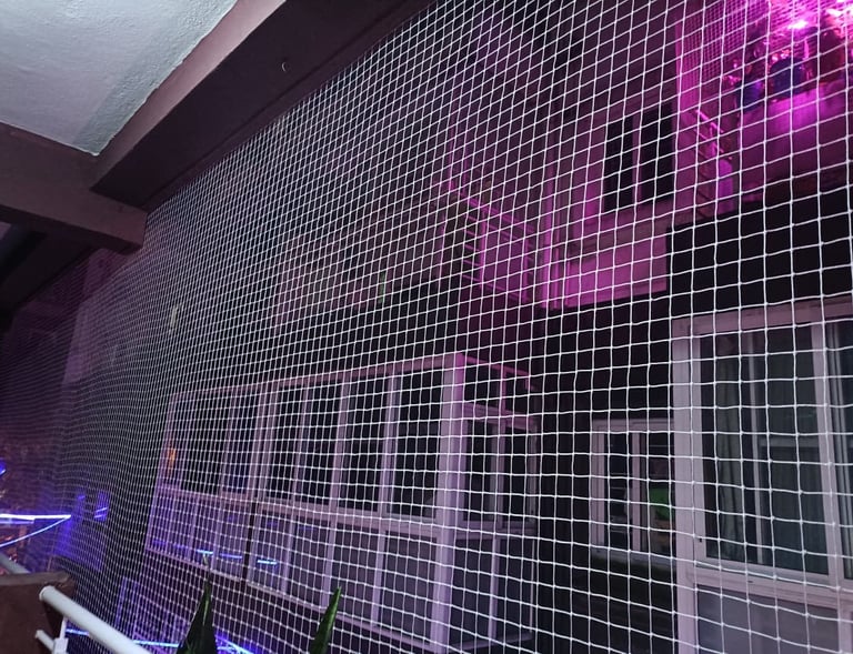 Monkey safety net installed on a balcony in Coimbatore, preventing wildlife intrusion.