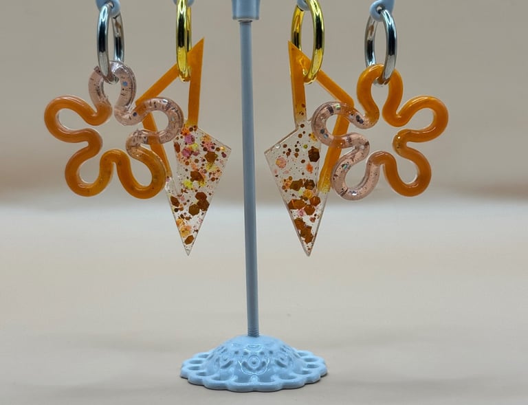 a pair of scissors and scissors on a stand