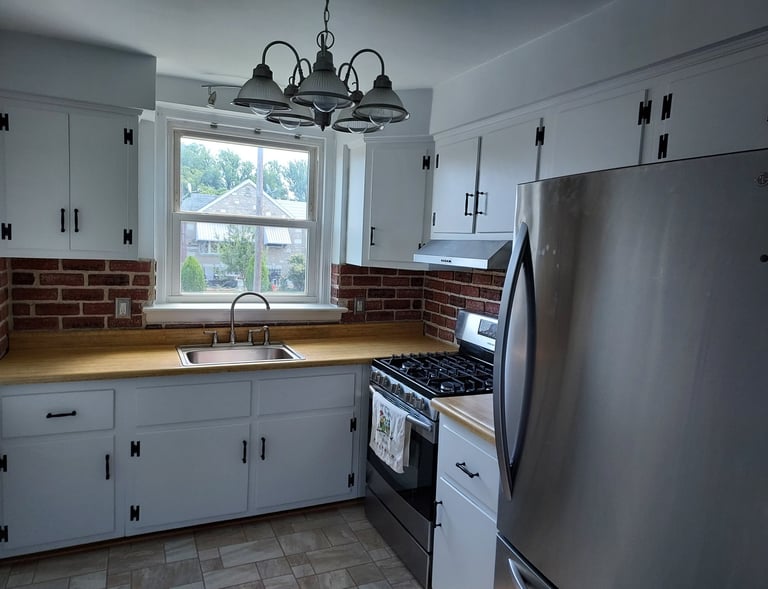 a pitcure of a finished painted  kitchen 
