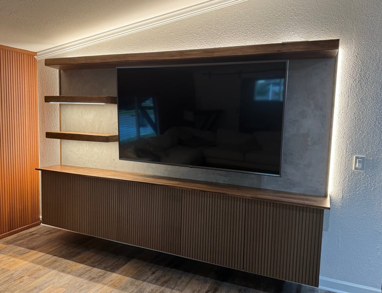 Custom made living room wall unit. Custom made shelved and cabinet- Britto's Home Improvement