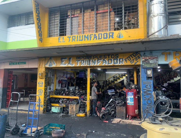 a man standing in front of a store