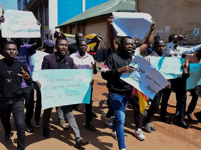 a group of people holding signs that read'stop and protest '