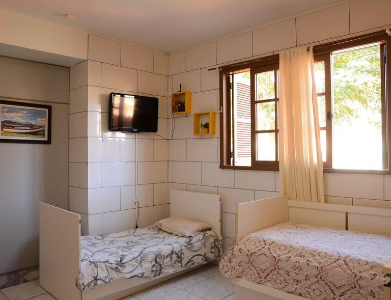 Quarto Duplo com TV
