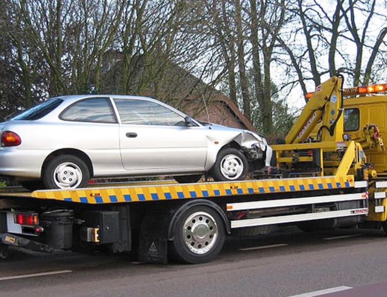 a car being recoverd from accident