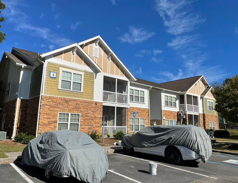apartment building being transformed by Ganet Painting painters with quality paint.