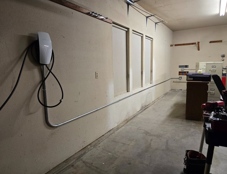 Wall mounted Tesla Gen 3 Wall Connector with surface mounted 3/4 in. EMT conduit