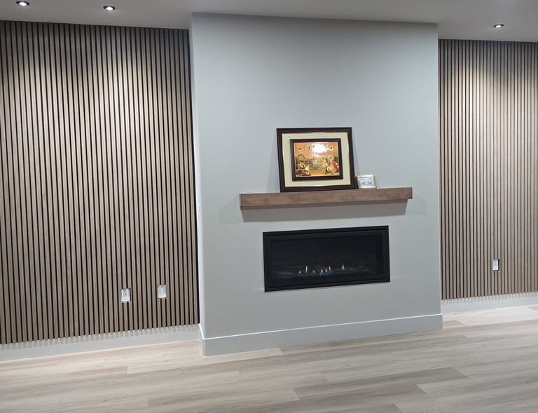 Ceiling mounted recessed LED gimbals oriented towards accent walls