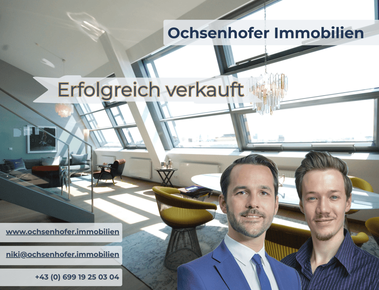 Ochsenhofer Immobilien real estate agents in a bright modern penthouse apartment successfully sold.
