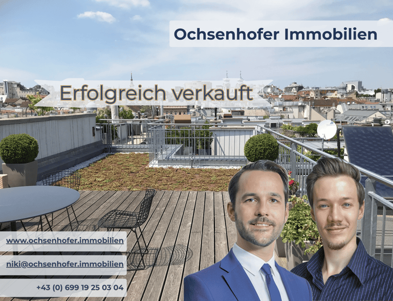 Ochsenhofer Immobilien agents smiling in front of a modern rooftop terrace with a city view, successfully sold.