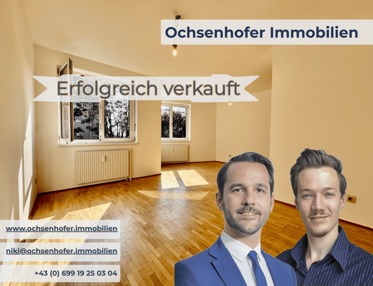 Empty apartment sold by Ochsenhofer Immobilien real estate agents in Austria with parquet flooring.