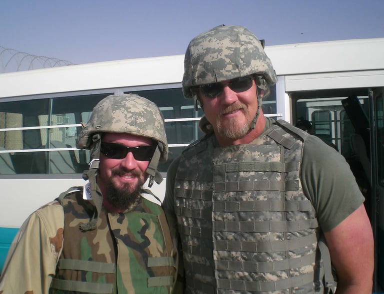 Jim Burns and Trace Adkins in Iraq in 2007.