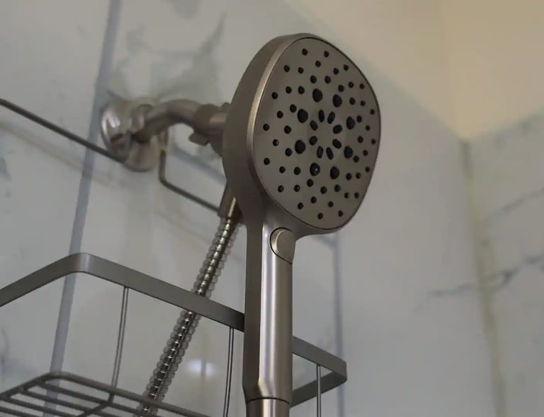 Senior care modern bathroom with white tiles, comfortable shower heads.