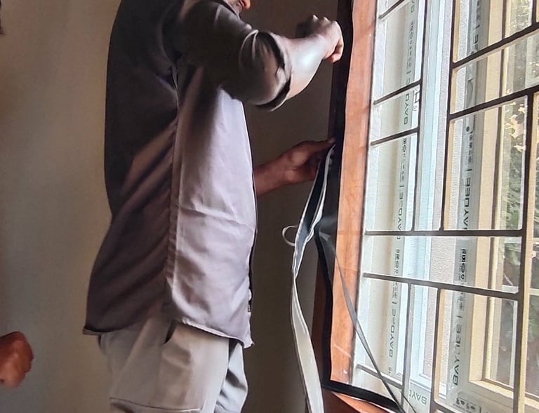 Side view of a balcony with a mosquito net installed by Arjilli Safety Nets, highlighting the velcro