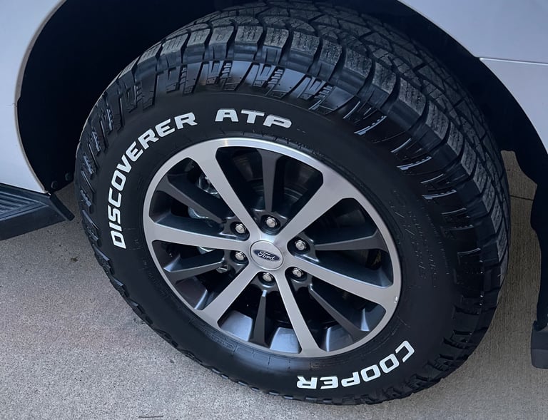 Auto detailing in Logan OH with freshly dressed tires and clean wheels