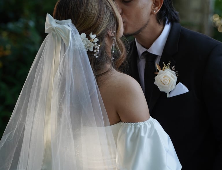 man and woman kissing