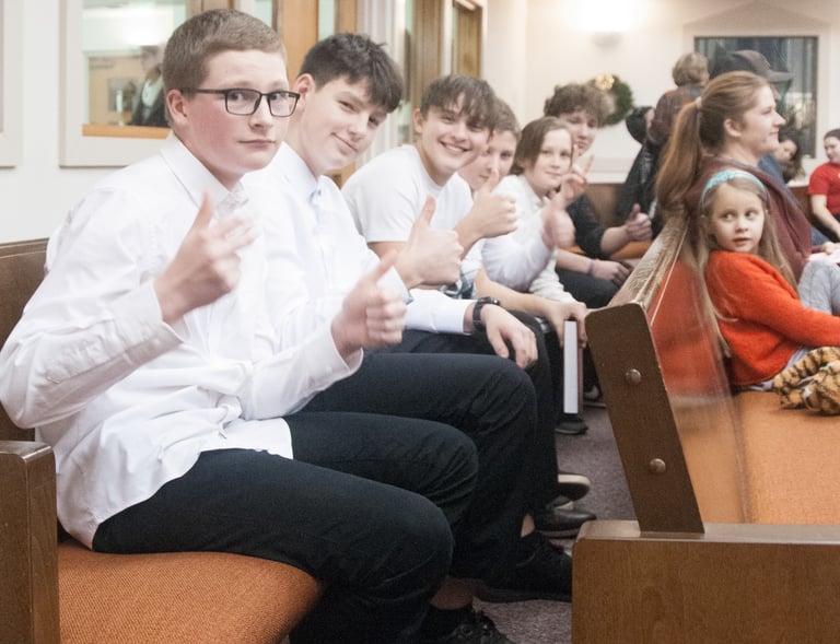 Students from TAHB watch & listen to their peers at a winter concert