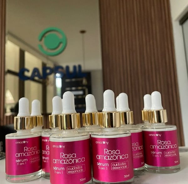 a group of bottles of cosmetics products on a counter