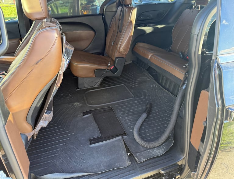vacuuming mini-van rear seat