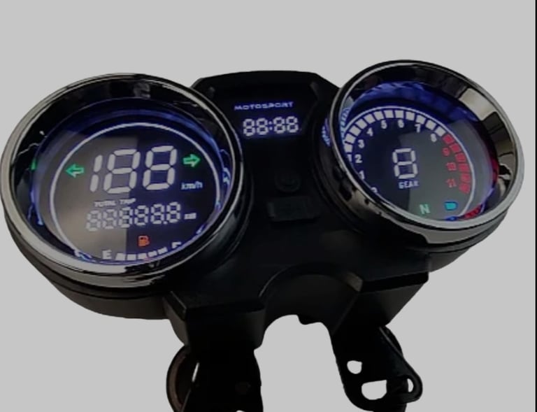 a motorcycle with a clock on the front and a clock on the back