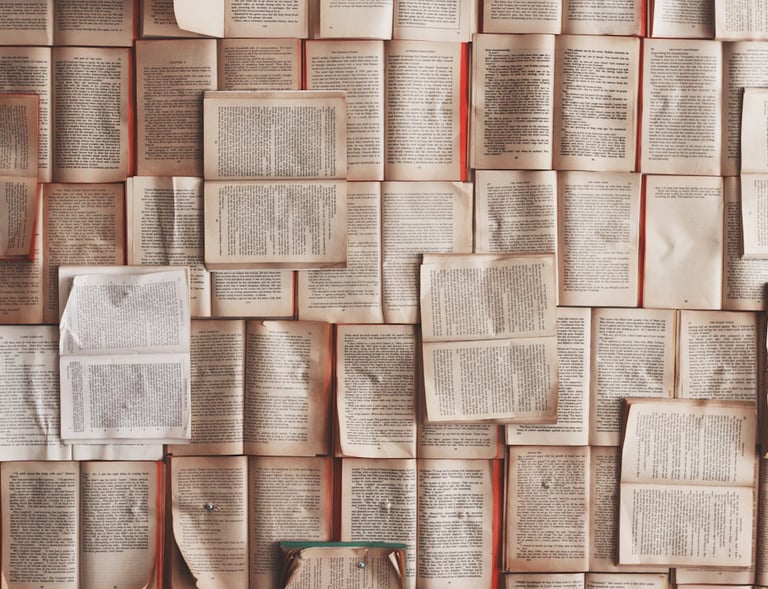 a wall of books and a bottle of wine