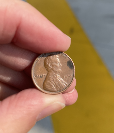 a person holding a penny penny penny penny penny penny penny penny penny penny penny penny