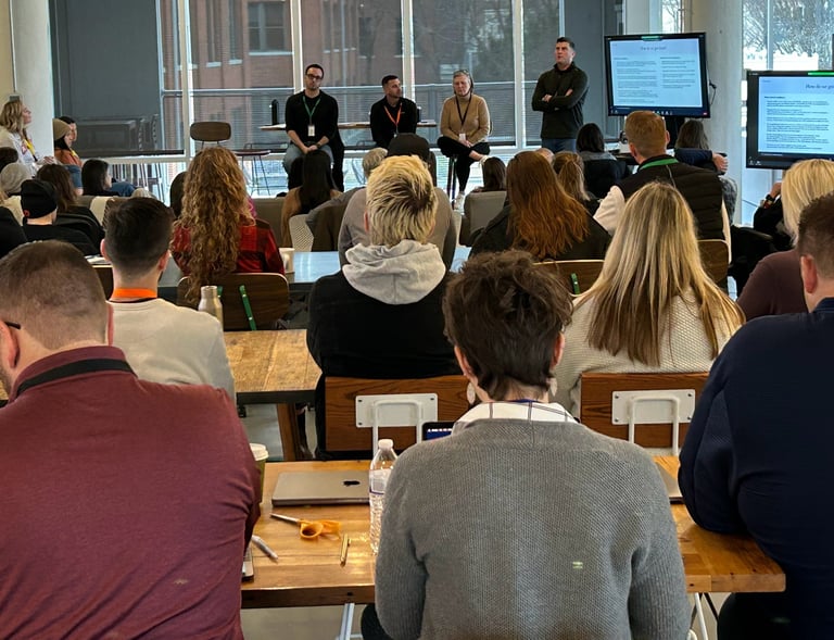 Company Q&A session about merging two corporate cultures, scrappy and sophisticated,.