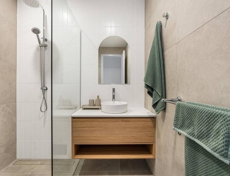 a bathroom with a sink and a shower at Arvia Villa Koala Park