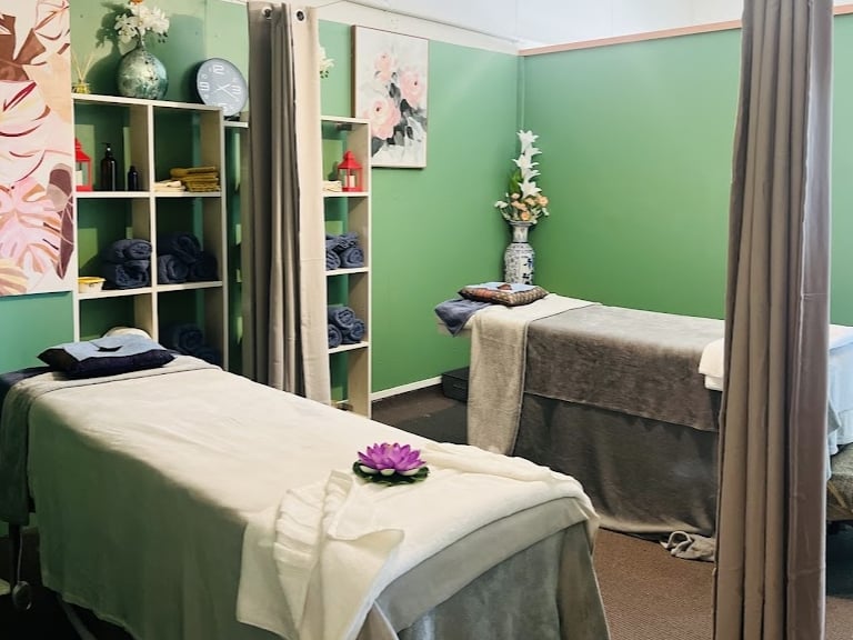 Clean and peaceful massage room at Ashburton Thai Massage & Spa with traditional Thai decor