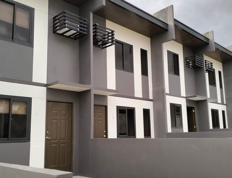 Move-in ready townhouse near SJDM City Hall — modern 2-storey with bedroom, garage, and balcony."