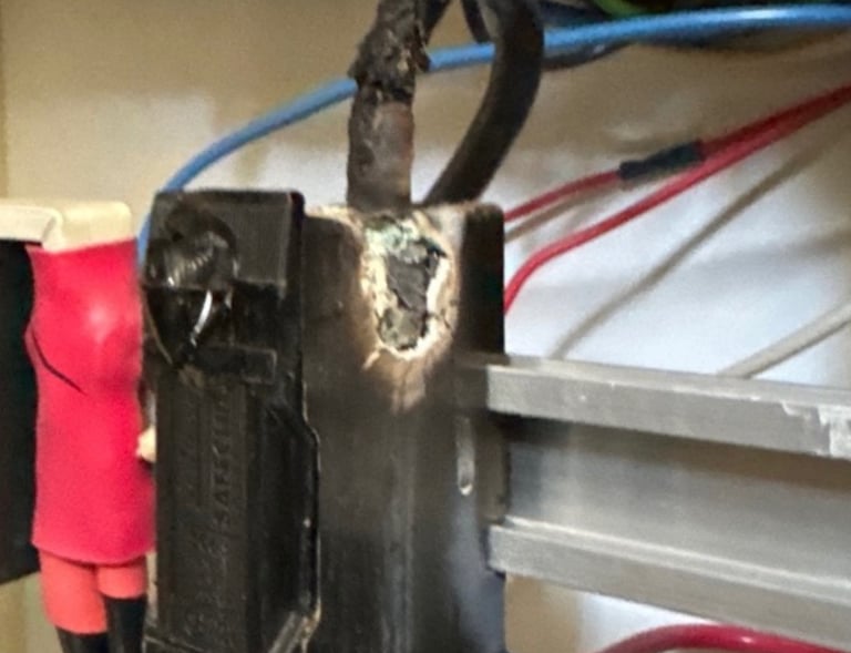 what could be the condition of your switchboard or fuse board when you hear buzzy noise or smell