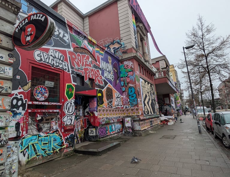 Rote Flora in Hamburg with graffiti and street art, St. Pauli Szene mit urbaner Kunst und alternativer Kultur