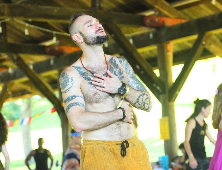 Feeling into the heart during the Higher Love Campout dances.
